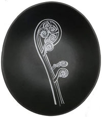 White Ponga On Black Bowl
