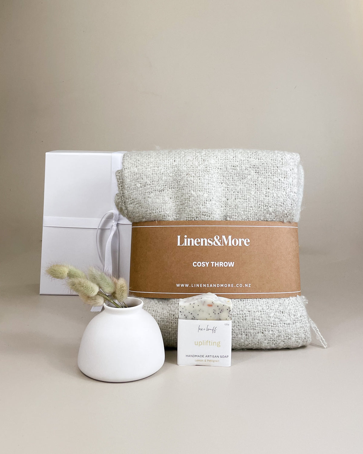 Little Luxury Gift Box featuring cosy throw, handmade soap and Ned Collections keepsake vase in elegant packaging.