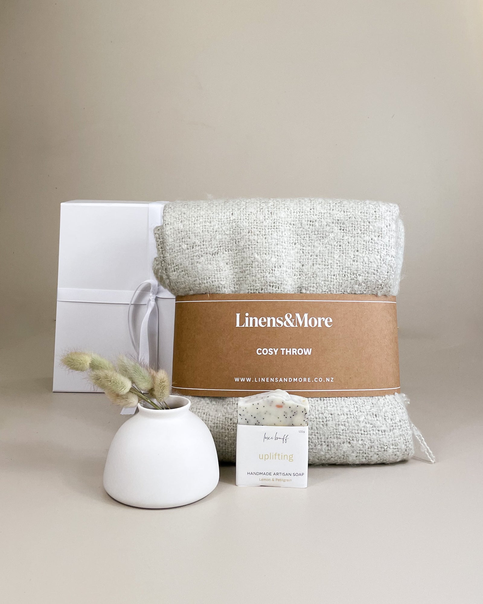 Little Luxury Gift Box featuring cosy throw, handmade soap and Ned Collections keepsake vase in elegant packaging.