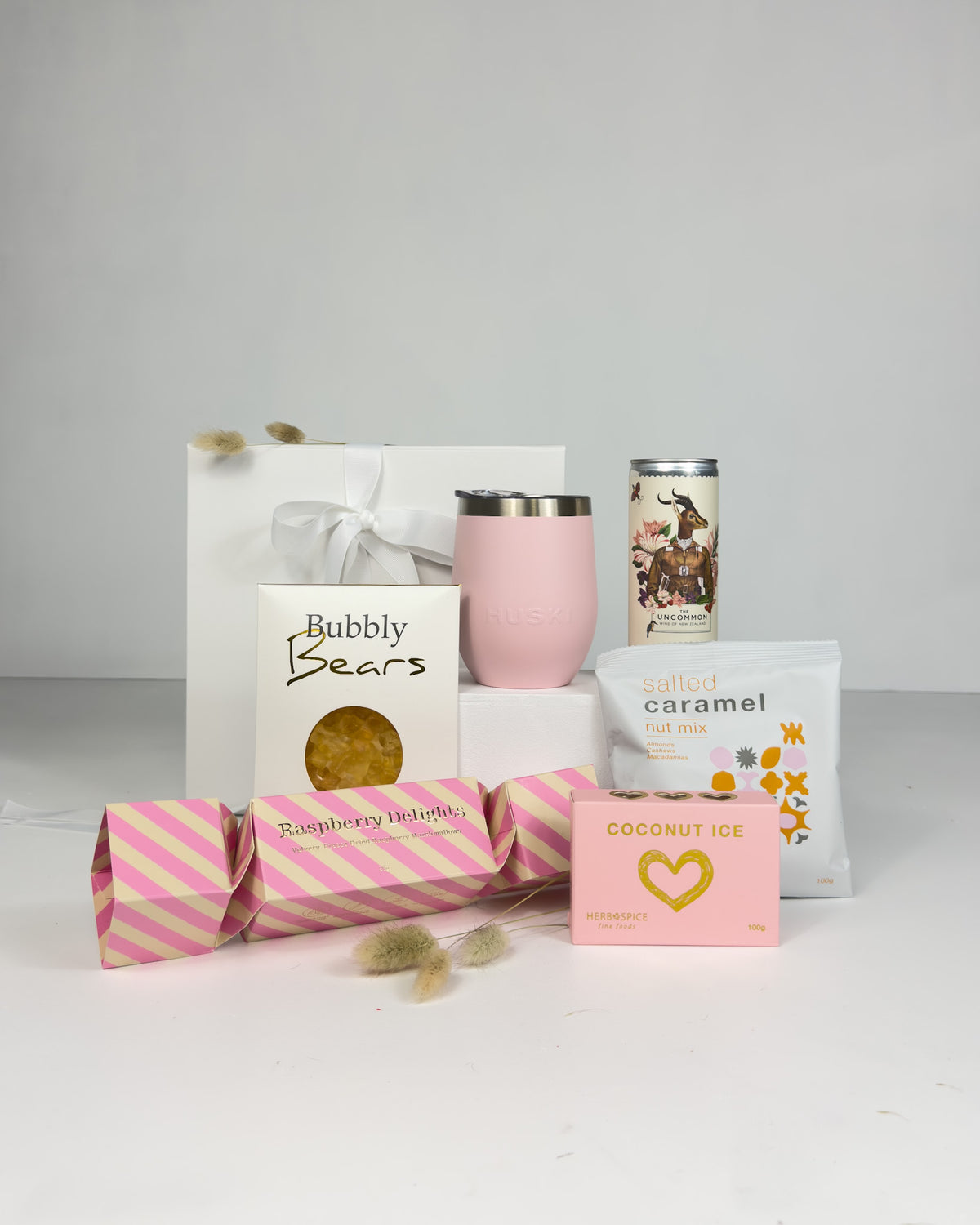 A Touch of Kindness Gift Box with rosé wine, Huski tumbler, sweet marshmallows and coconut ice, a gift for her for birthdays, thank yous and special occasions.