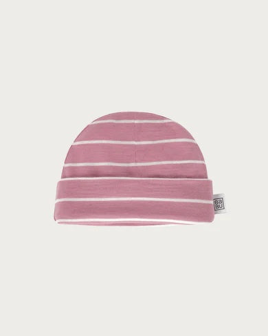 Newborn baby wearing the Babu Merino Baby Beanie made from 100% extrafine merino wool, soft breathable and warm infant hat with folded cuff for a secure comfortable fit.