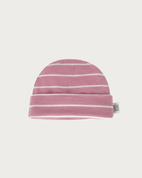 Newborn baby wearing the Babu Merino Baby Beanie made from 100% extrafine merino wool, soft breathable and warm infant hat with folded cuff for a secure comfortable fit.