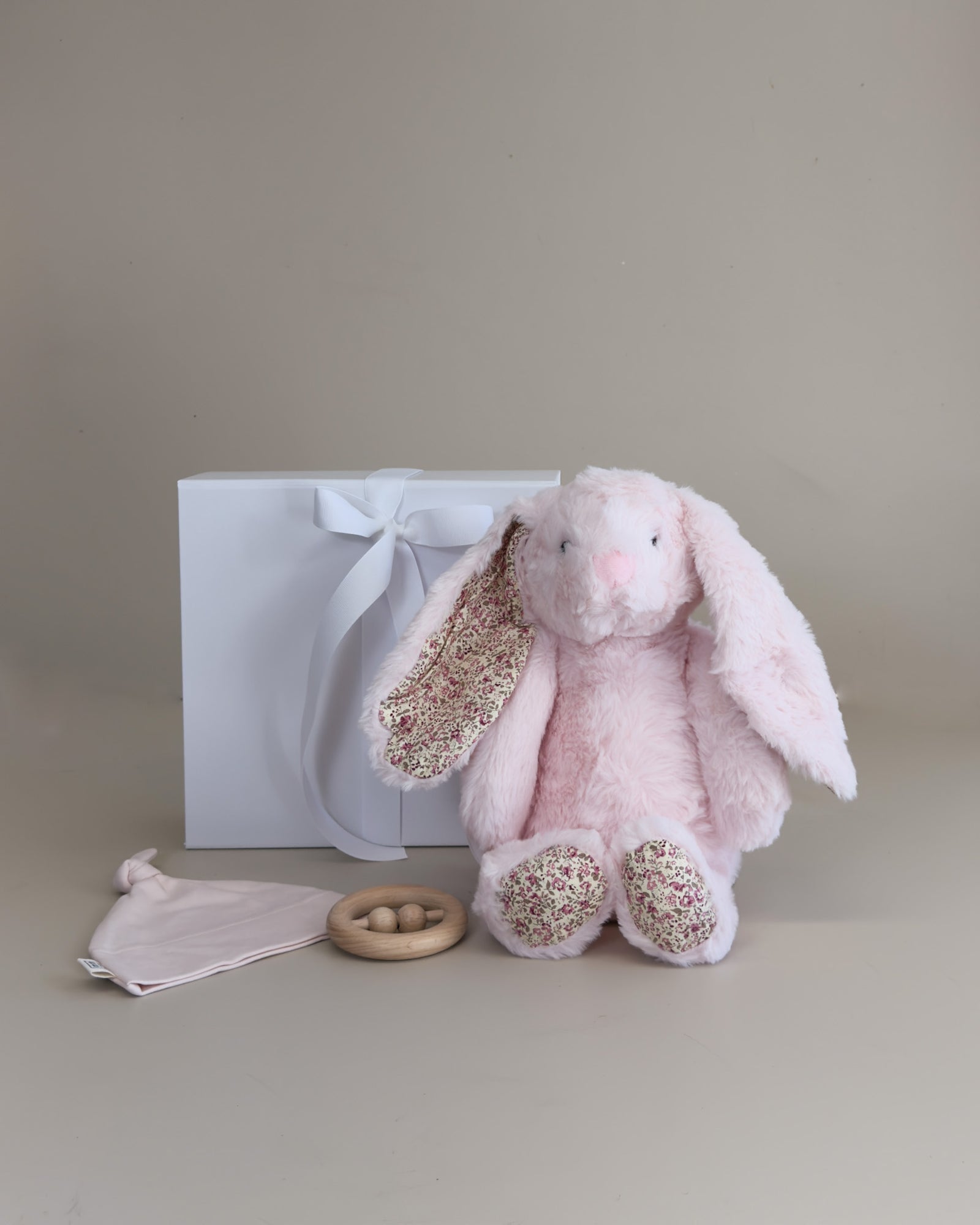 Baby Girl Newborn Gift Box with fluffy bunny, soft baby beanie and teething rattle