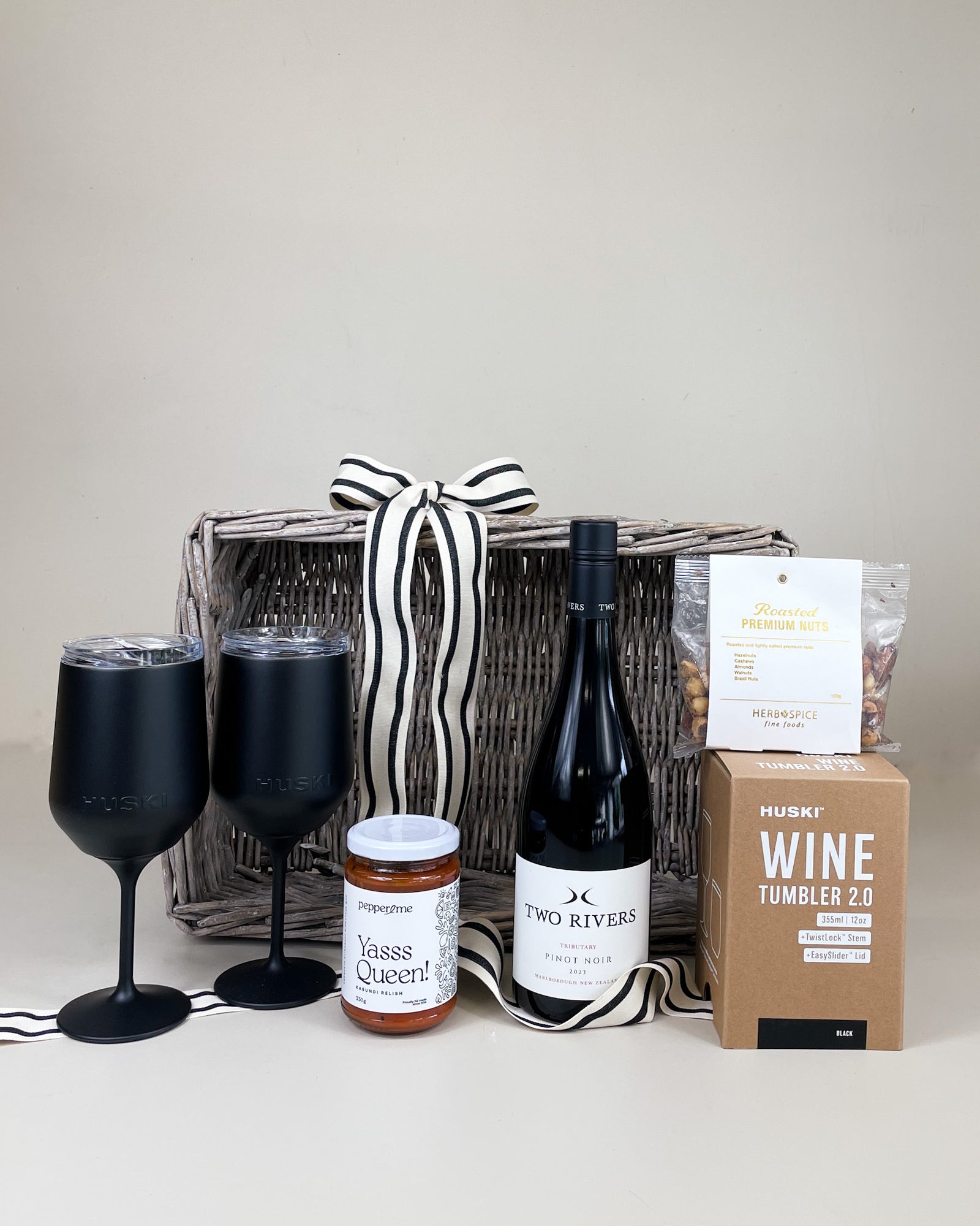 Congratulations Gift Basket NZ featuring a Huski Wine Tumbler, New Zealand wine, gourmet nuts and artisan relish in a luxury gift basket