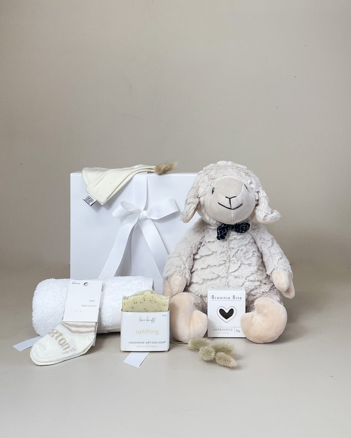 Congratulations New Parents Gift Box with Lily & George lamb, Merino baby beanie and cosy baby socks.
