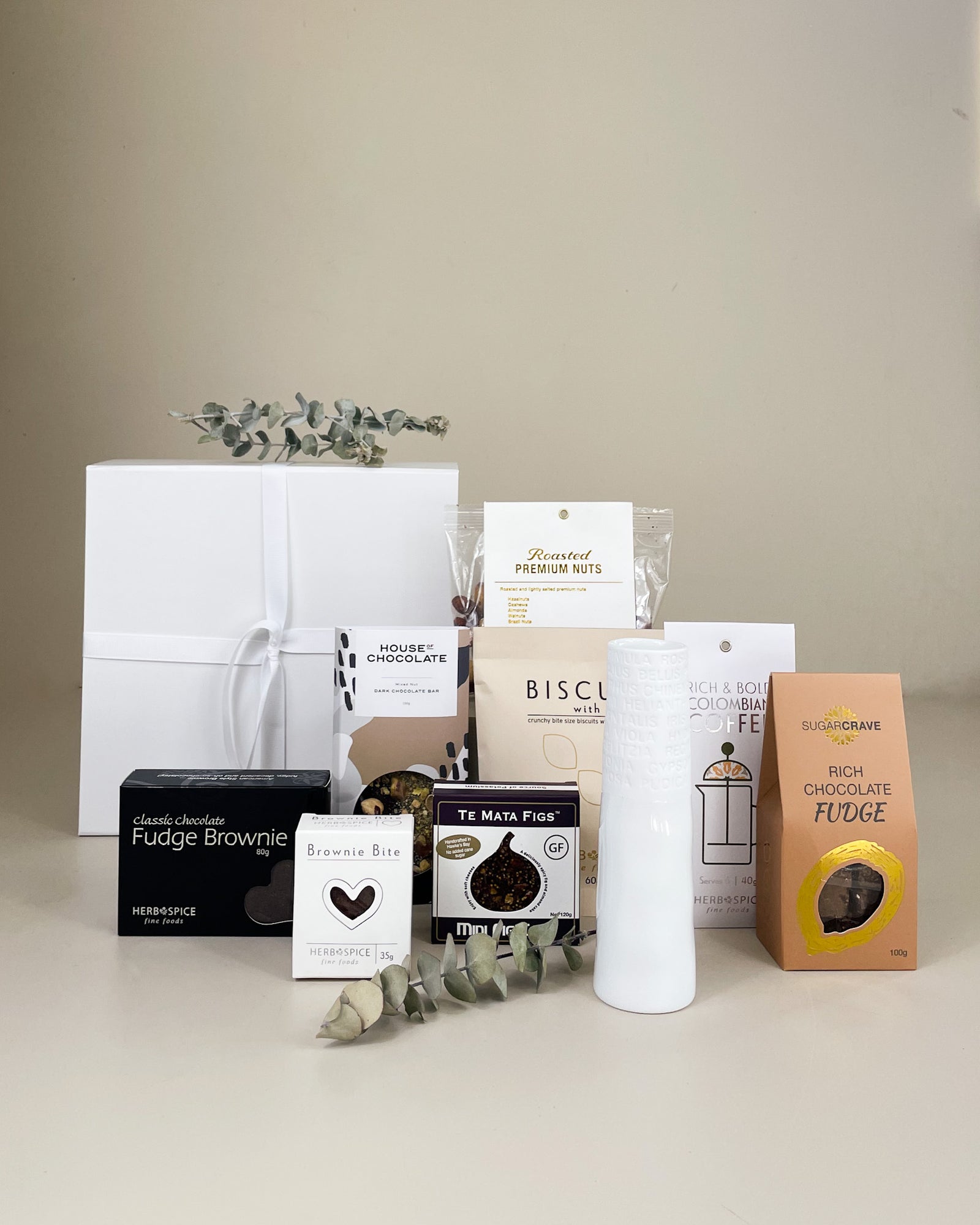 Sympathy gift box with artisan creamy fudge, gourmet fig cake, sweet treats, premium snacks, and optional elegant embossed porcelain vase, beautifully packaged for thoughtful condolence gifting in New Zealand.