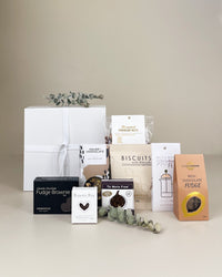 Sympathy gift box with artisan creamy fudge, gourmet fig cake, sweet treats, premium snacks, and optional elegant embossed porcelain vase, beautifully packaged for thoughtful condolence gifting in New Zealand.