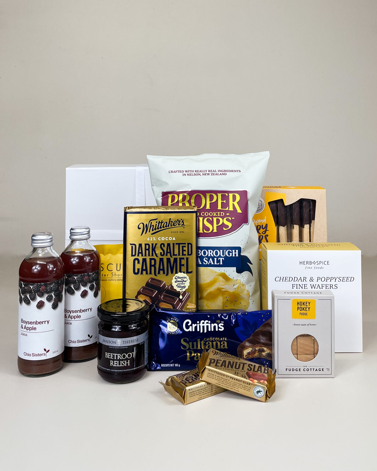Food for the Family Gift Box filled with Proper crisps, Whittaker's chocolate, fudge, juice and premium NZ-made gourmet treats, beautifully gift wrapped.