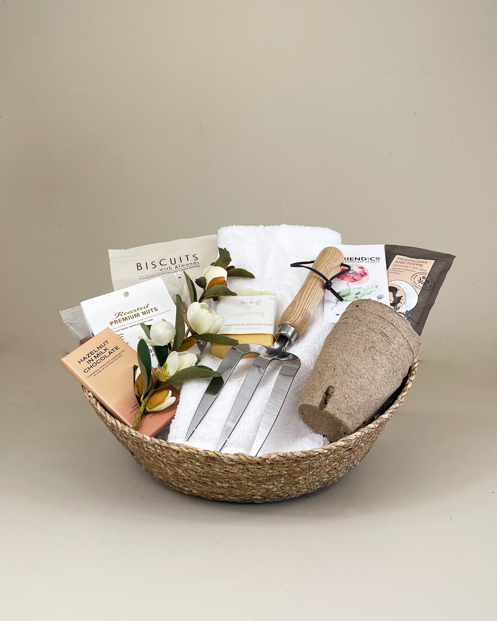 Garden Lover’s Gift Basket NZ with gardening tools, seeds, seedling tray, New Zealand chocolate, gourmet nuts and handmade soap