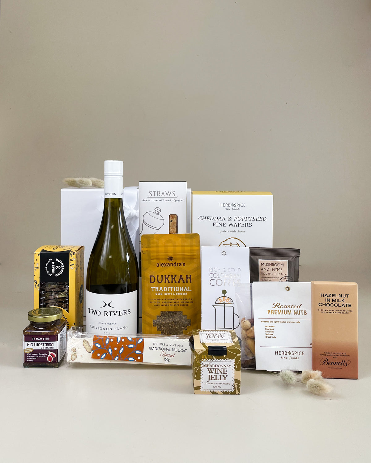 Gather & Share Food & Wine Gift Box with New Zealand sweet and savoury treats and a bottle of wine, beautifully presented for sharing and celebrating.