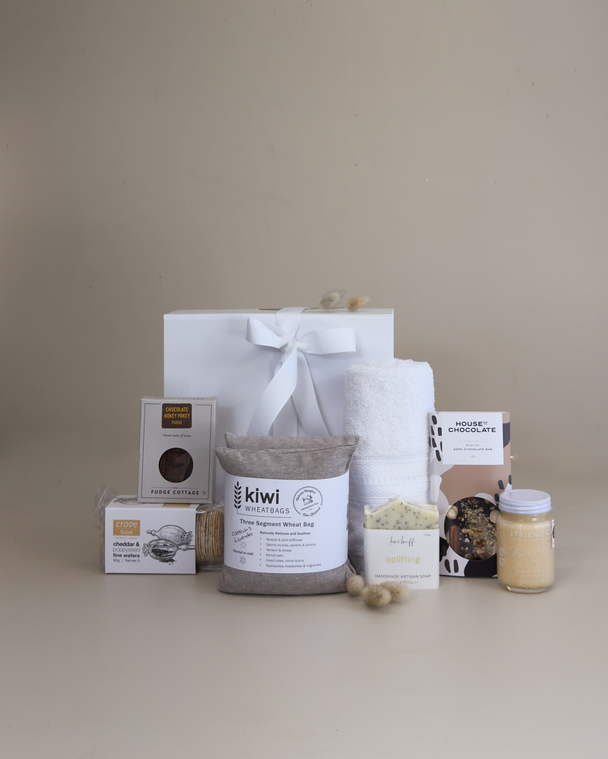 Get well gift basket NZ with premium honey, chocolate, handcrafted fudge and a comforting wheat bag.