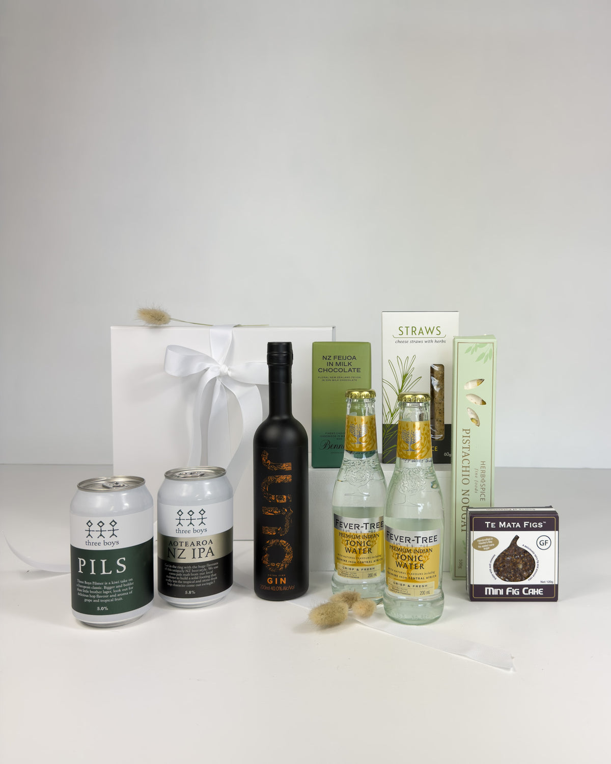 Premium Gin & Beer Gift Box for Two with gin, tonic, beer and gourmet snacks, beautifully presented in a white magnetic gift box.