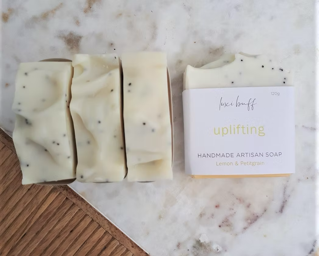 Natural organic New Zealand made uplifting body soap with lemon, petitgrain and poppy seeds for gentle exfoliation and refreshed skin.