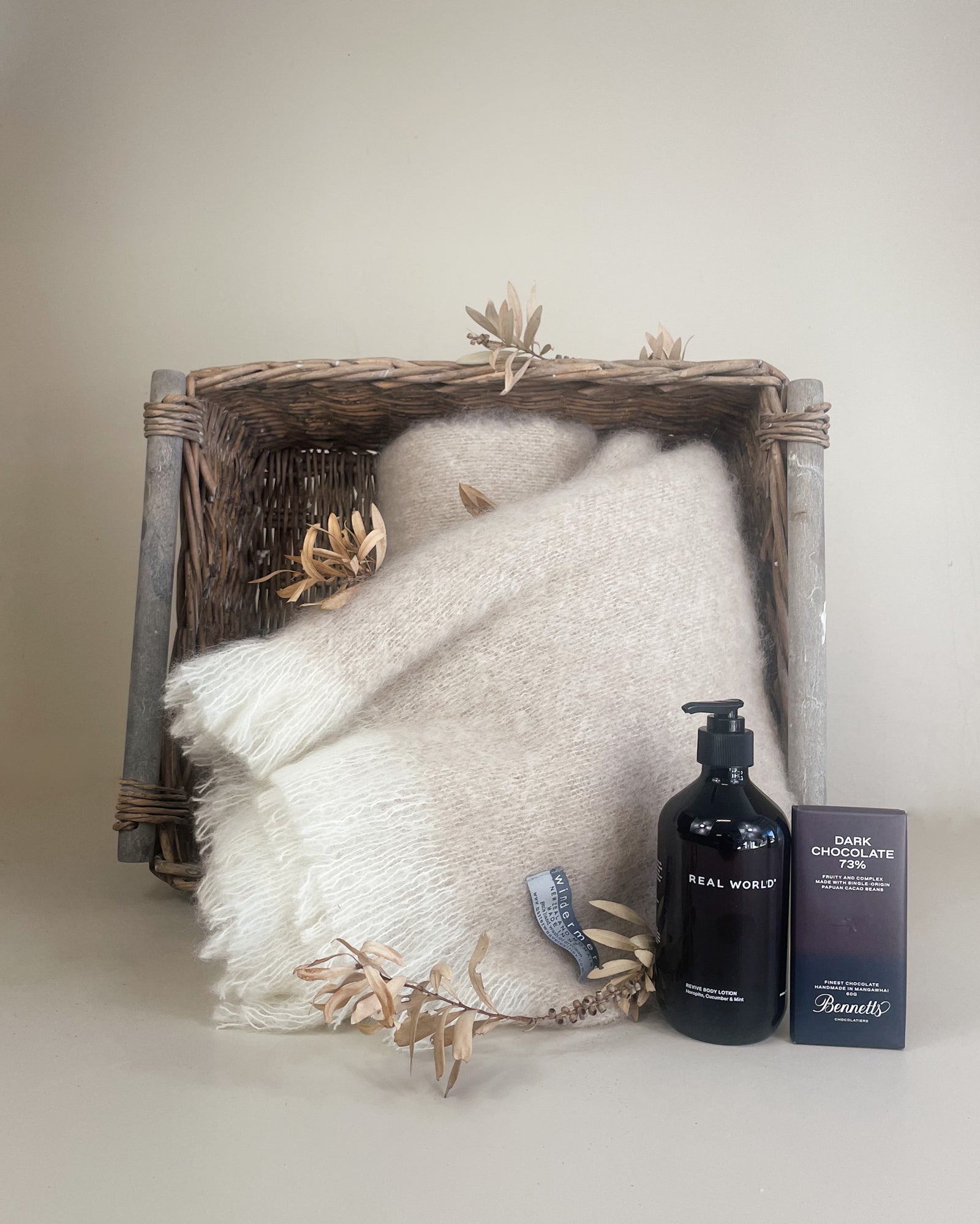 Luxury body lotion with botanical ingredients presented as part of NZ wellness gift basket