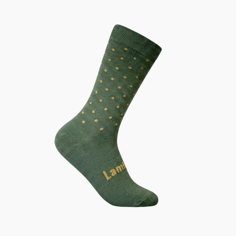 Lamington Gatsby New Zealand made Merino wool crew socks in green with gold polka dots, soft, breathable and warm for everyday wear.