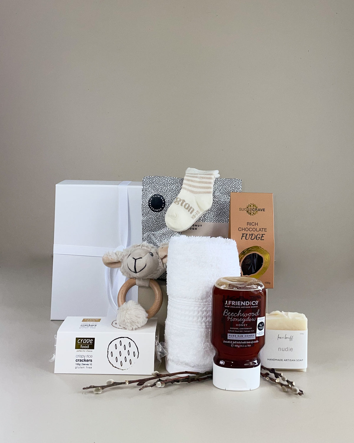 NZ Artisan Newborn Gift Box with merino wool, natural baby essentials and wooden teether