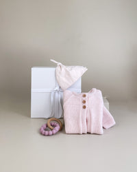 New Zealand merino baby cardigan and knot beanie.