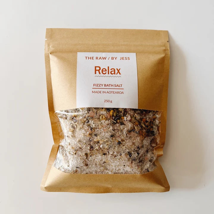 The Raw By Jess Relax Fizzy Bath Salts with chamomile flowers, lavender buds, and coconut oil displayed as a luxury pamper gift box add-on in New Zealand.