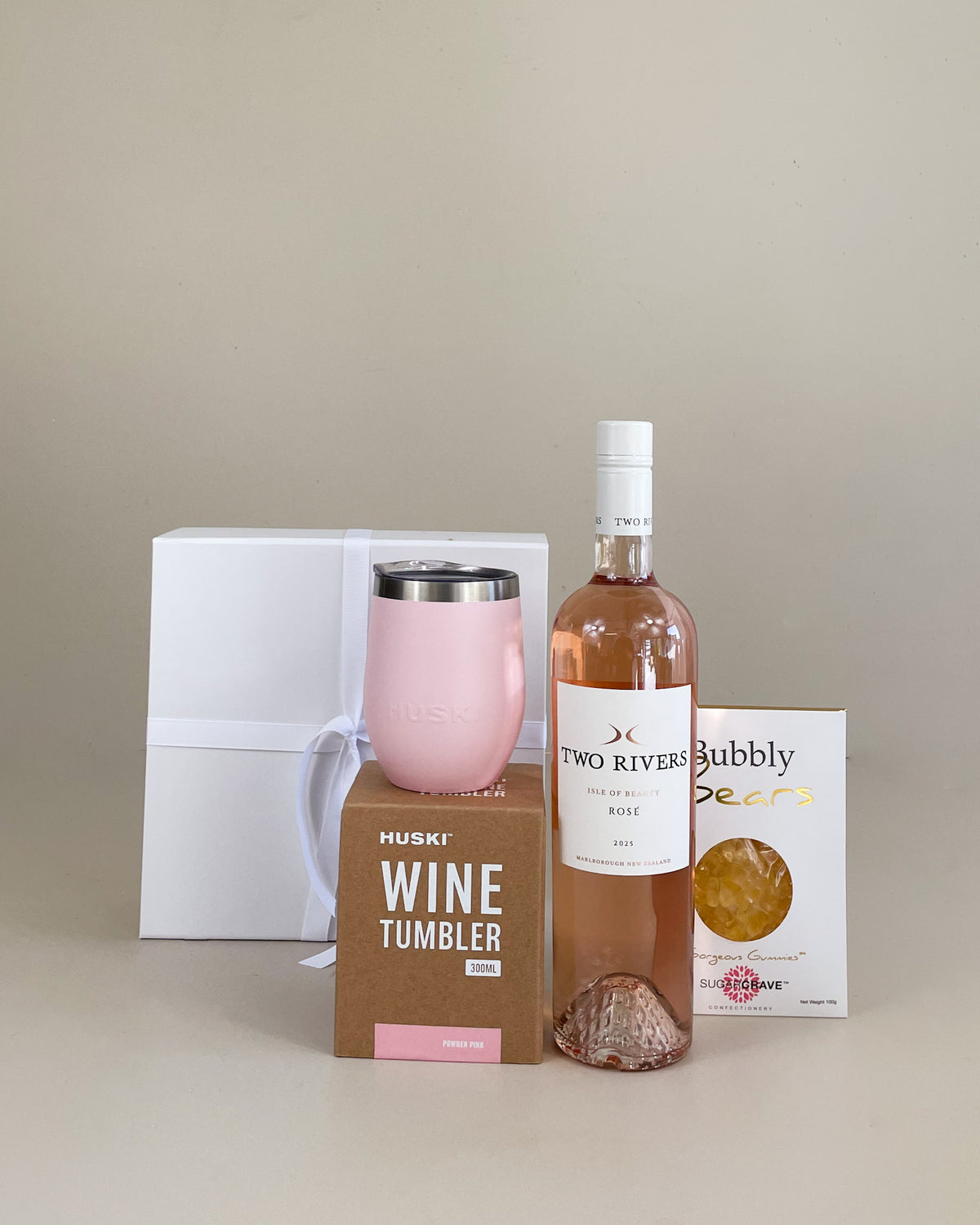 Rosé Indulgence Gift Box with premium rosé wine, luxury NZ-made sweets, and keepsake Huski tumbler, beautifully packaged for birthdays, thank-yous, or special celebrations.