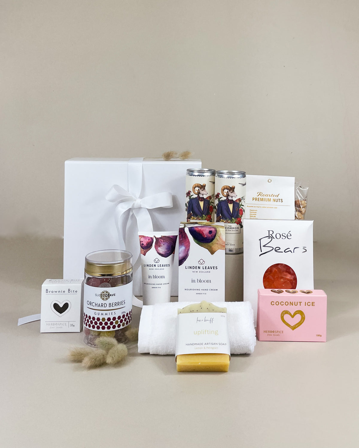 NZ gourmet gift box for her with New Zealand wine, natural hand cream, organic soap and sweet treats