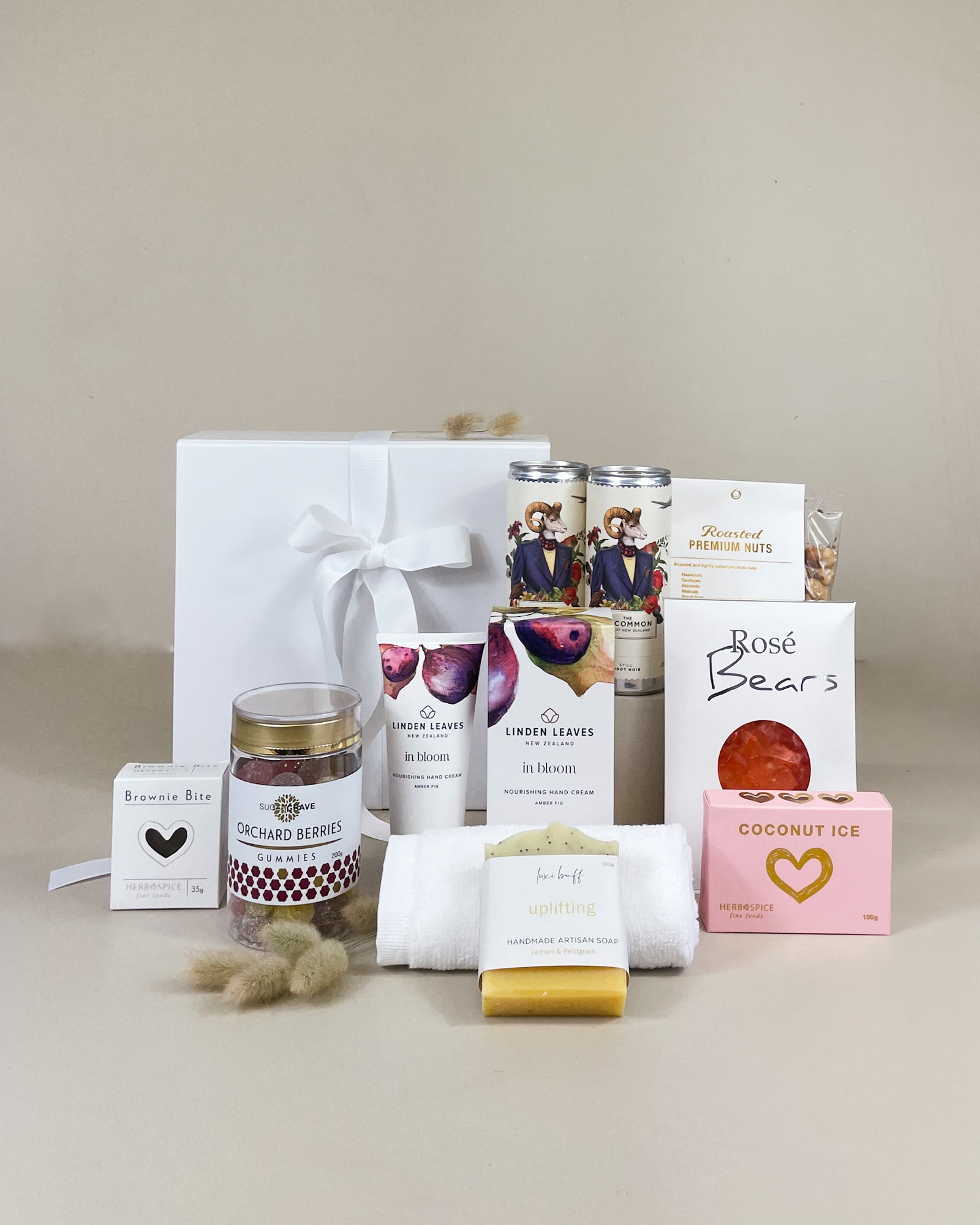 NZ gourmet gift box for her with New Zealand wine, natural hand cream, organic soap and sweet treats
