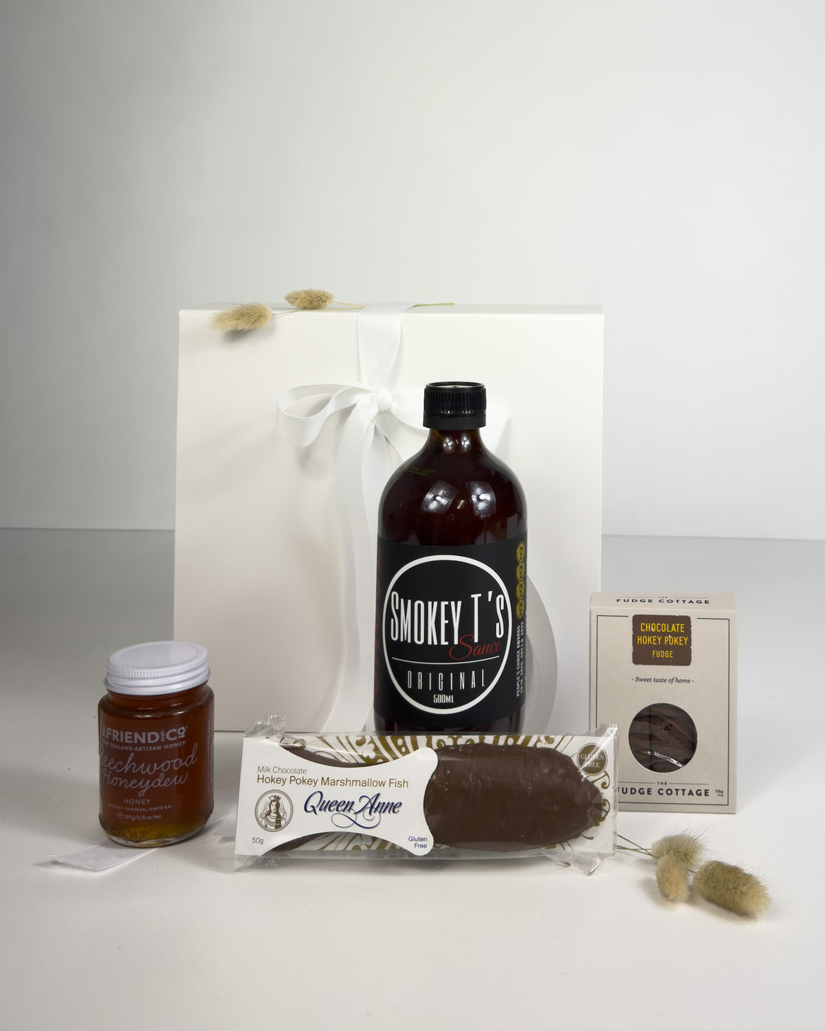 Taste of Canterbury Gift Box with The Fudge Cottage fudge, J Friend & Co honey, Smokey T’s award-winning BBQ sauce and Queen Anne chocolate fish.