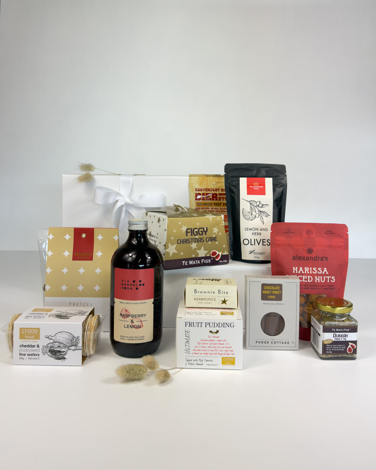 Christmas Food Gift Box filled with New Zealand sweet and savoury treats, including chocolate, fudge, nuts and olives.