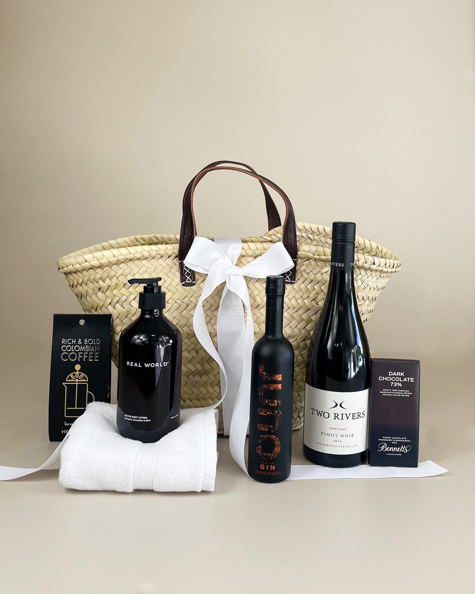 Signature NZ Indulgence Gift Basket with New Zealand wine, artisan gin, handmade chocolates and natural body care
