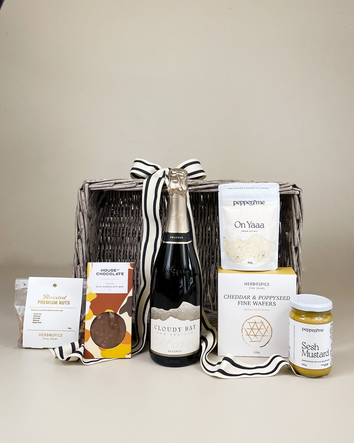 Ultimate Wine & Food Gift Basket featuring premium New Zealand wine, artisan gourmet treats, elegant gift packaging, ribbon, and personalised gift card.