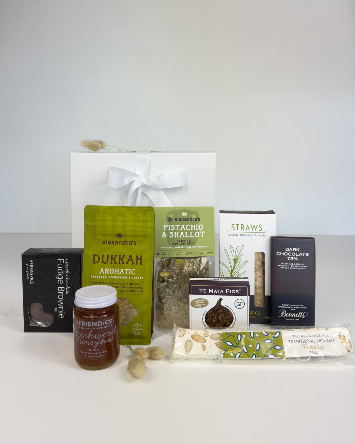 New Zealand gourmet gift box filled with a selection of locally made sweet and savoury treats, beautifully presented as a thoughtful gift.