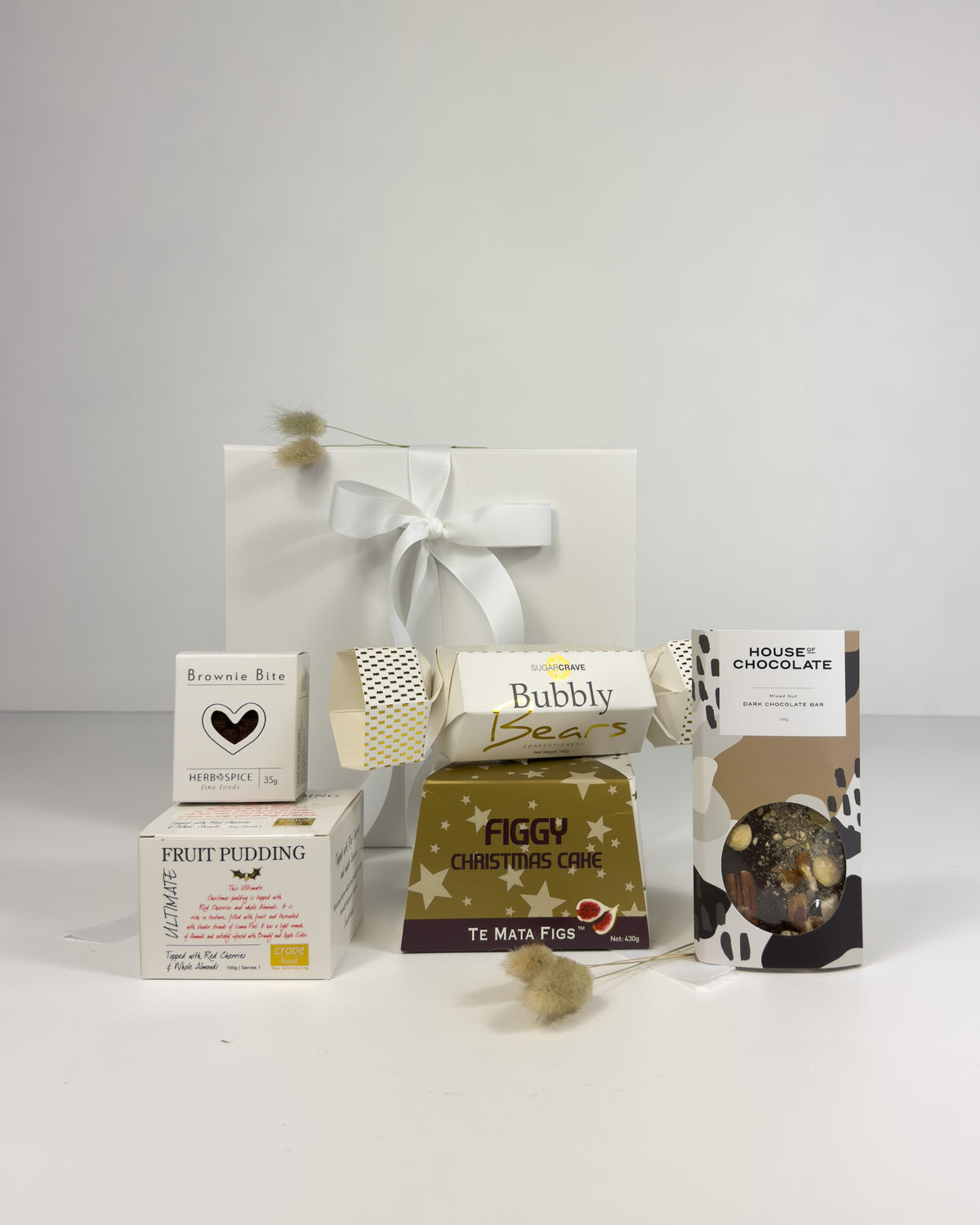Traditional Christmas Gift Box filled with New Zealand-made figgy Christmas cake, chocolates and festive sweet treats.
