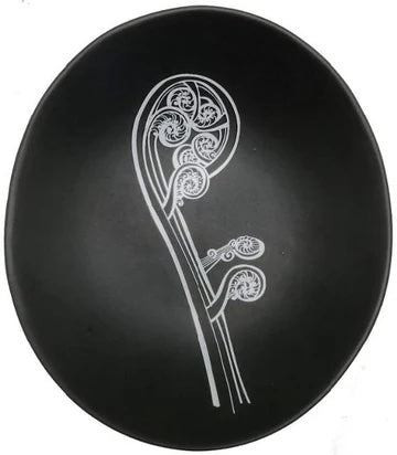 White Ponga On Black Bowl