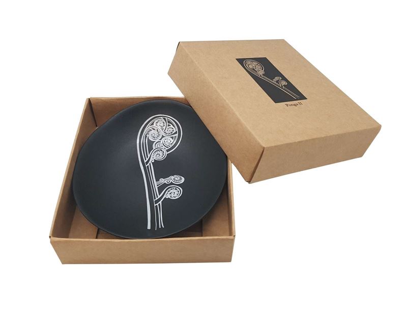 White Ponga On Black Bowl