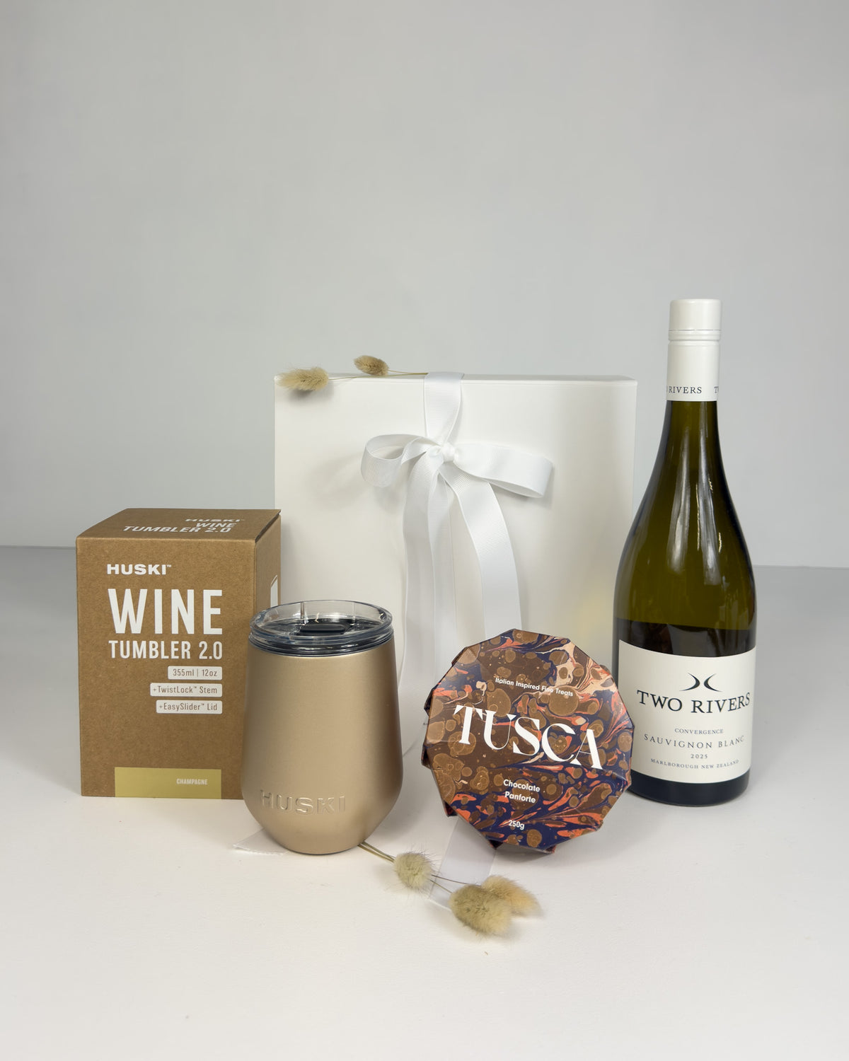 Wine & Huski Gift Box for Her featuring a Huski wine tumbler, bottle of wine and Tusca artisan panforte in a premium gift box.
